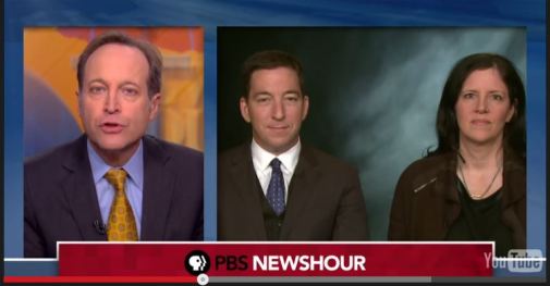 The highest of the high ground: Glenn Greenwald (center) appears on PBS newshour.